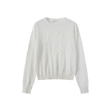 Coco Blanc Chunky Crew Sweater with embossed center