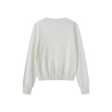 Coco Blanc Chunky Crew Sweater with embossed center