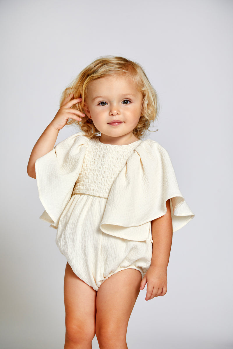 Nueces Ivory Textured Calm Puff Sleeve Romper